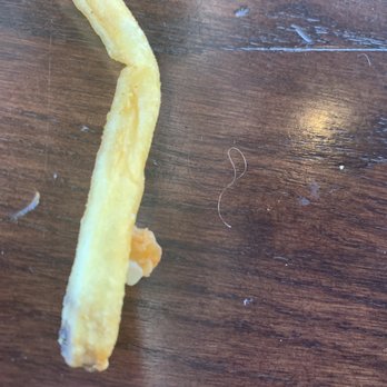 PDQ Chicken - The hair that was on this fry before I threw it - Chicken Shop Near Me - Deerfield Beach, Florida