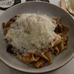 Pappardelle with braised short rib ragout before mixing cheese. Pappardelle with braised short rib ragout before mixing cheese.
