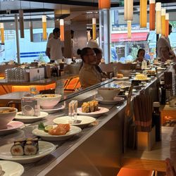 Conveyor belt with sushi going around