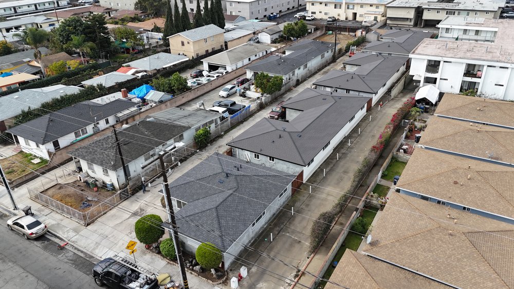 Slide of Meza Roofing Systems