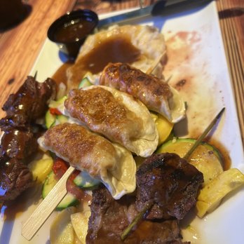 Miller's Ale House - TERIYAKI STEAK & POTSTICKER SKEWERS - Sports Bars Near Me - Winter Garden, Florida Miller's Ale House - TERIYAKI STEAK & POTSTICKER SKEWERS - Sports Bars Near Me - Winter Garden, Florida