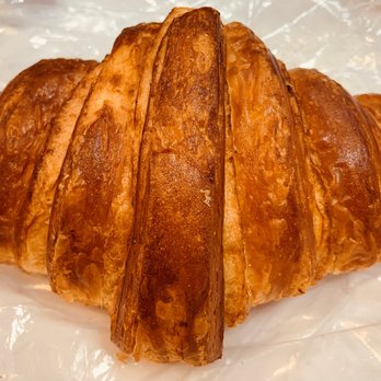 Moss Cafe - a croissant on a plastic wrapper - Cafes Near Me - Bronx, New York