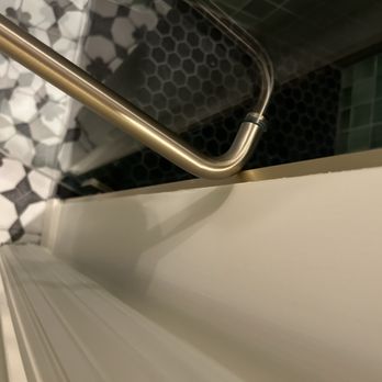 The Mining Exchange - Shower door hitting tile - Hotels Near Me - Colorado Springs, Colorado