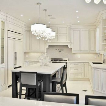Spaces Cabinetry Tile Flooring - a large kitchen with a center island - Flooring Near Me - Costa Mesa, California Spaces Cabinetry Tile Flooring - a large kitchen with a center island - Flooring Near Me - Costa Mesa, California