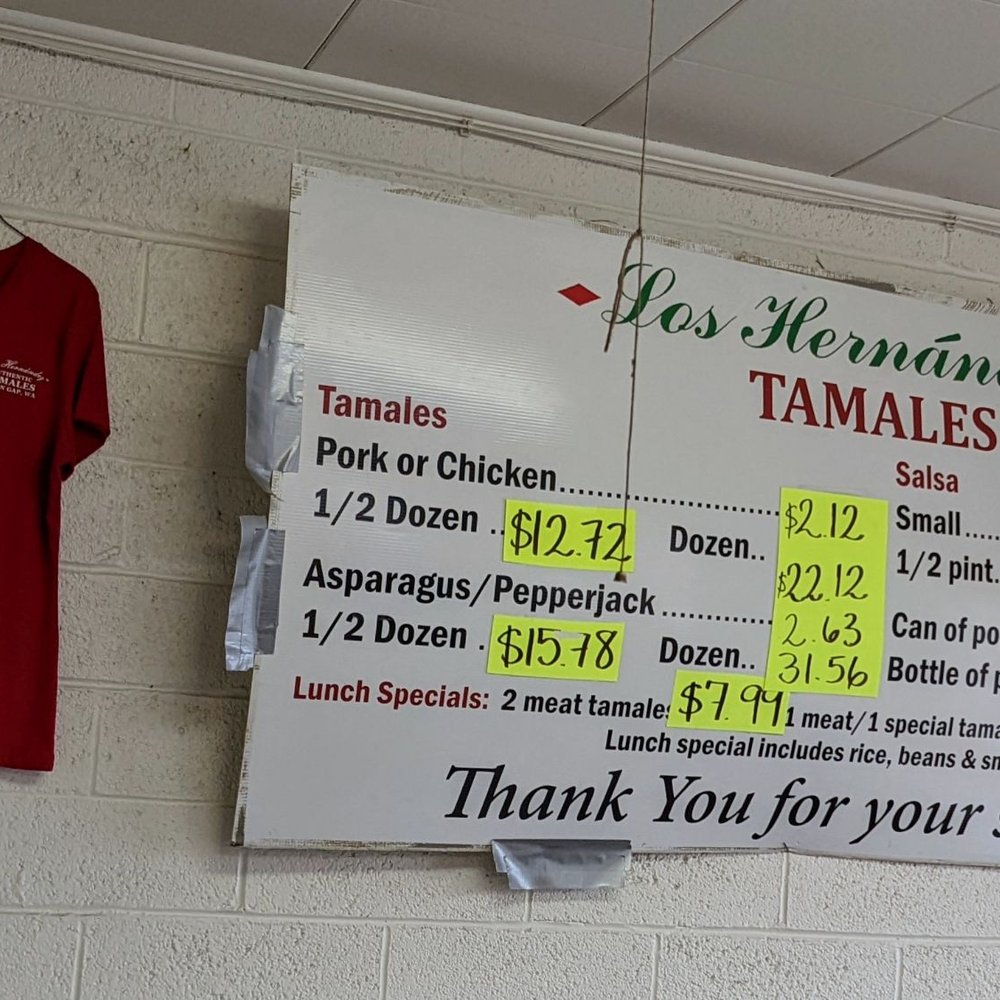 Los Hernandez Tamales - a red t - shirt hanging on a wall - Mexican Near Me - Union Gap, Washington Los Hernandez Tamales - a red t - shirt hanging on a wall - Mexican Near Me - Union Gap, Washington