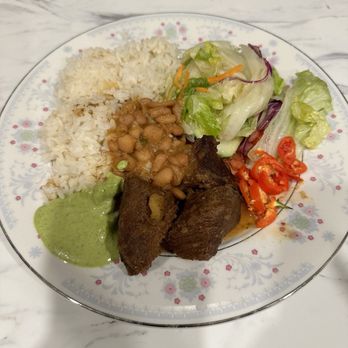 La Margarita Cocina Latina - Carne Guisada with arroz blanco, Habichuela Roja, Ensalada Verde, Cilantro Lime Sauce and my touch of peppers. Delicious! - Latin American Near Me - St. Cloud, Florida La Margarita Cocina Latina - Carne Guisada with arroz blanco, Habichuela Roja, Ensalada Verde, Cilantro Lime Sauce and my touch of peppers. Delicious! - Latin American Near Me - St. Cloud, Florida
