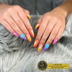 West Lafayette Nail & Spa - Spring, but make it art. Soft tones and precise details that feel like fresh air at your fingertips. Book your seasonal reset.