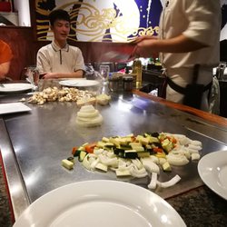 Ten Teppanyaki & Izakaya - Onion volcano blowing steam