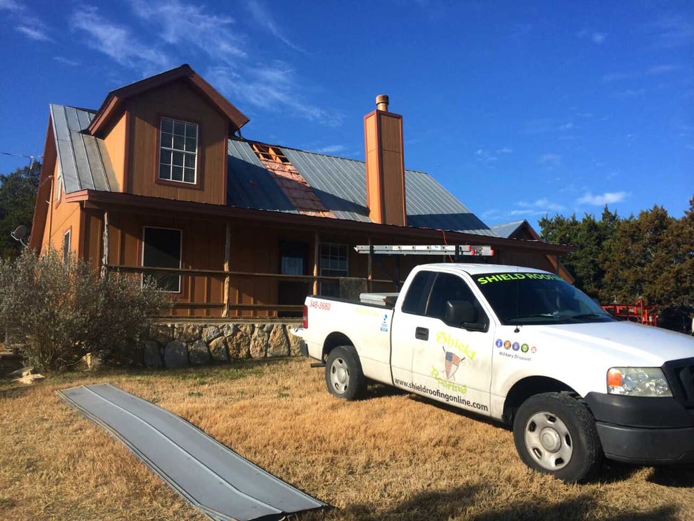 Slide of Shield Roofing