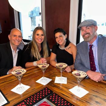 Layali Providence - 4 happy customers and their flaming martinis - Lounges Near Me - Providence, Rhode Island