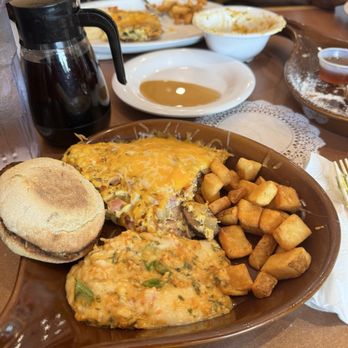 Crackings - Destin - Lobster grits and half of an omelette. - Breakfast & Brunch Near Me - Destin, Florida Crackings - Destin - Lobster grits and half of an omelette. - Breakfast & Brunch Near Me - Destin, Florida
