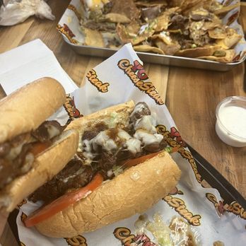 Yo Cheesesteak - Half eaten nachYos and steak sandwich. So much meat!!! - Cheesesteaks Near Me - Temecula, California Yo Cheesesteak - Half eaten nachYos and steak sandwich. So much meat!!! - Cheesesteaks Near Me - Temecula, California