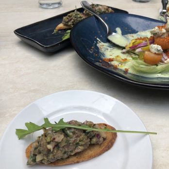 Abruzzo Italian Kitchen - Three nice size crostini of Elk Tartar & an Italian Wedge Salad. Very nice start! - Italian Near Me - Whitefish, Montana