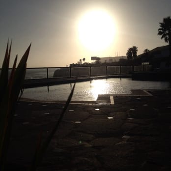Las Rocas Resort - Sunset over the north pool. Has a beach entrance perfect for young kids or keeping cool while sunbathing - Day Spas Near Me - Rosarito, BCN Las Rocas Resort - Sunset over the north pool. Has a beach entrance perfect for young kids or keeping cool while sunbathing - Day Spas Near Me - Rosarito, BCN