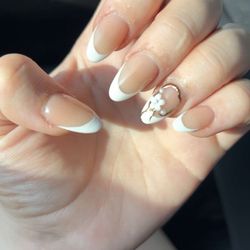 M Spa & Nails - Got my nails done it was a full set with painted french tips and i got some gems as well