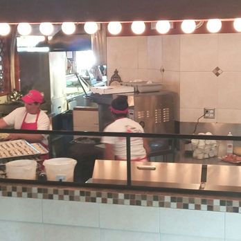 Gianni's Pizza - Staff making twisty bread. - Italian Near Me - Monterey, California Gianni's Pizza - Staff making twisty bread. - Italian Near Me - Monterey, California