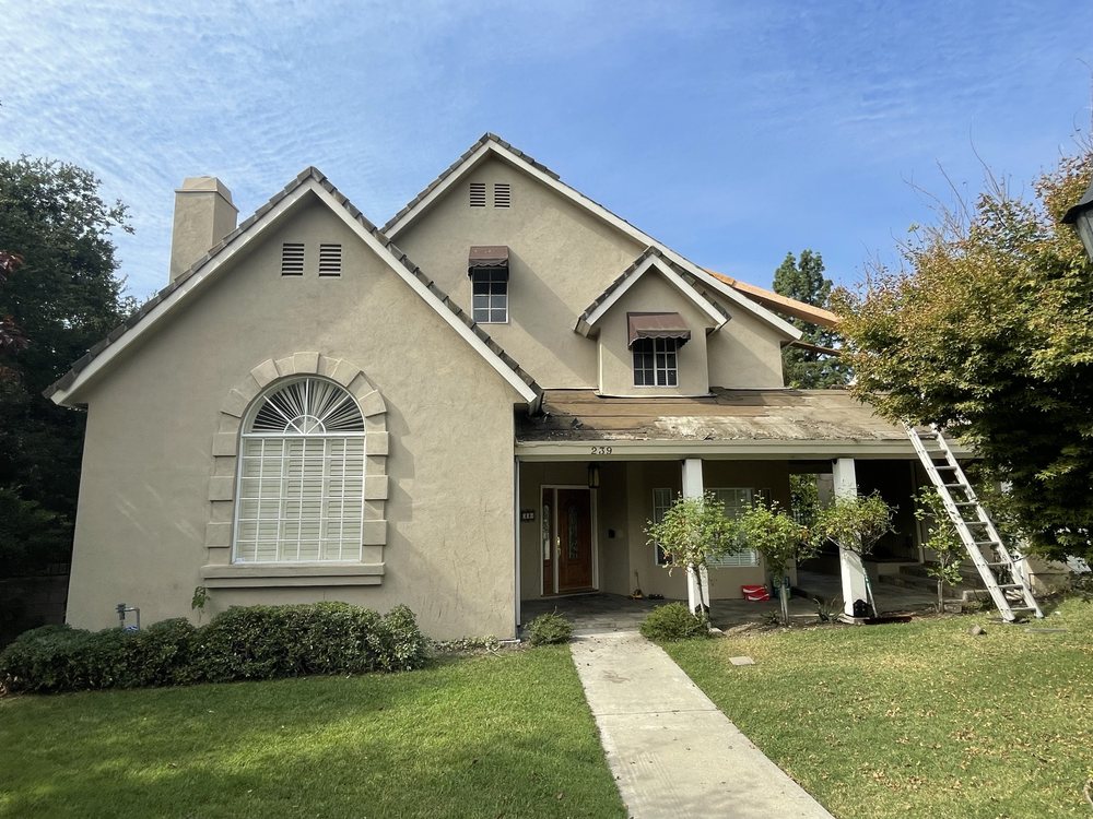 Slide of The Local Friendly Roofer