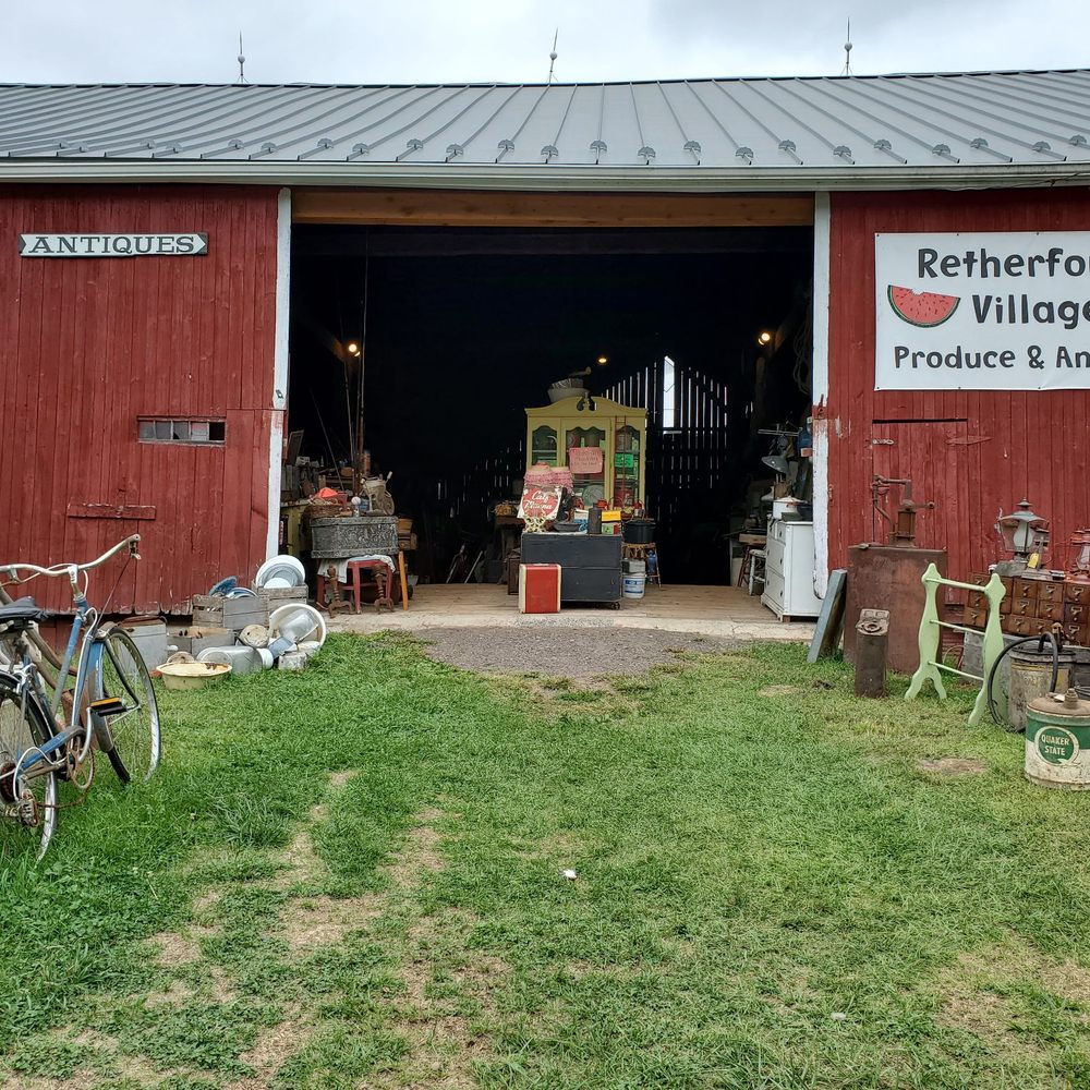 Retherford's village - a red barn with a bicycle in front of it - Antiques Near Me - Benton, Pennsylvania Retherford's village - a red barn with a bicycle in front of it - Antiques Near Me - Benton, Pennsylvania
