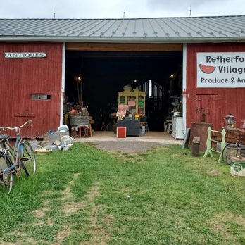 Retherford's village - a red barn with a bicycle in front of it - Antiques Near Me - Benton, Pennsylvania Retherford's village - a red barn with a bicycle in front of it - Antiques Near Me - Benton, Pennsylvania