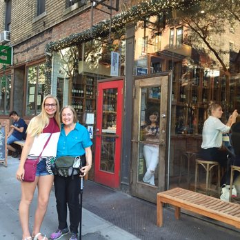 Briciola - My mom and daughter outside Bricola. It was a little hard to figure out which door was the one to enter (use the door at the bar). - Italian Near Me - New York, New York
