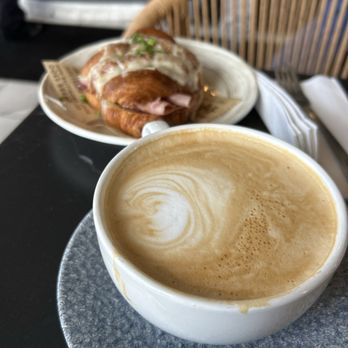 Kneads Bakeshop - Vanilla latte and ham and cheese bechamel croissant - Bakeries Near Me - Baltimore, Maryland Kneads Bakeshop - Vanilla latte and ham and cheese bechamel croissant - Bakeries Near Me - Baltimore, Maryland