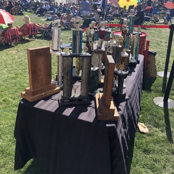Prairie Smoke & Spice - a table full of trophies - Food Trucks Near Me Prairie Smoke & Spice - a table full of trophies - Food Trucks Near Me