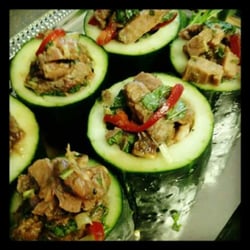 Brown Sugar Catering - Thai beef salad in cucumber cups.