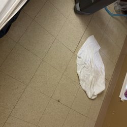 Interlochen Health and Rehabilitation Center - This is a photo of a two week old towel that's been on my mothers floor from her air hookup leaking that nobody's attended to.
