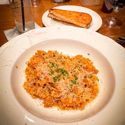 Treo Kitchen & Bar - Radiatori Pasta, side of sourdough toast.