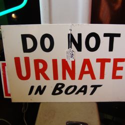 Johnny Junk & Co. - A vintage metal sign from deep in the bowels of a large freighter ship - don't pee inside the ship!