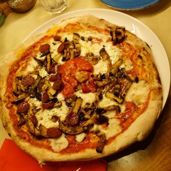 Tuscania - A Deliciously prepared Pizza. Vegetarian plus pepperoni on one side. - Mediterranean Near Me - Barcelona, B Tuscania - A Deliciously prepared Pizza. Vegetarian plus pepperoni on one side. - Mediterranean Near Me - Barcelona, B