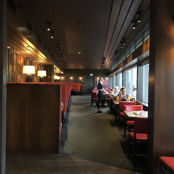 Scarlet - a restaurant with red booths and red chairs - Canadian (New) Near Me - Saskatoon, Saskatchewan