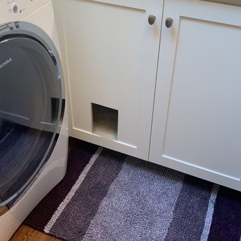 Kennyman The Handyman - Pet hole placed in a laundry room cabinet door for cats to enter their litter pan - Plumbing Near Me Kennyman The Handyman - Pet hole placed in a laundry room cabinet door for cats to enter their litter pan - Plumbing Near Me