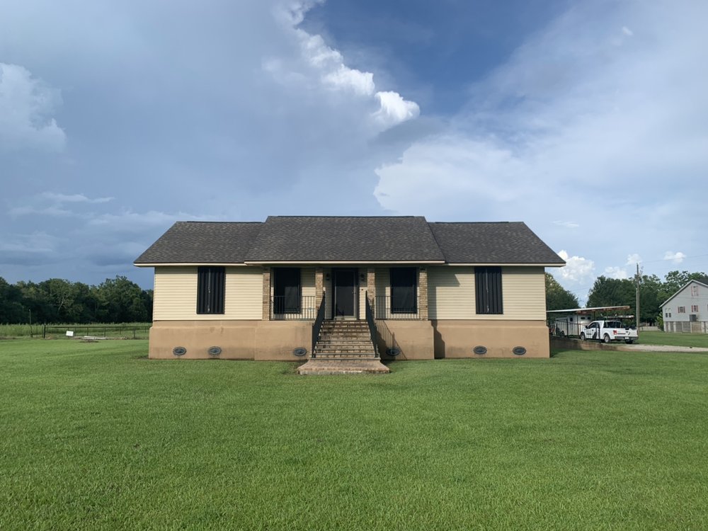 Slide of Pelican Roofing