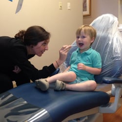 Compass Dental - Anna counting Jack's teeth