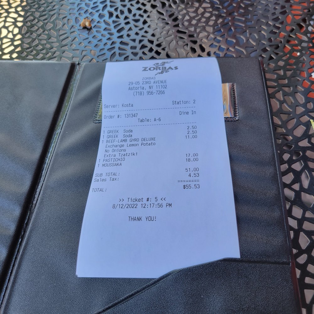 Zorba's Souvlaki Plus - a receipt on a table - Greek Near Me - Astoria, New York Zorba's Souvlaki Plus - a receipt on a table - Greek Near Me - Astoria, New York