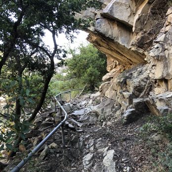 San Ysidro Falls Trail - A railing helping scale one of the steepest sections of the trail, though much of it no longer exists - Hiking Near Me - Montecito, California