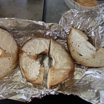 Parma Market and Bakery - a half eaten bagel with a bite taken out of it - Caterers Near Me - Ridgefield, Connecticut Parma Market and Bakery - a half eaten bagel with a bite taken out of it - Caterers Near Me - Ridgefield, Connecticut