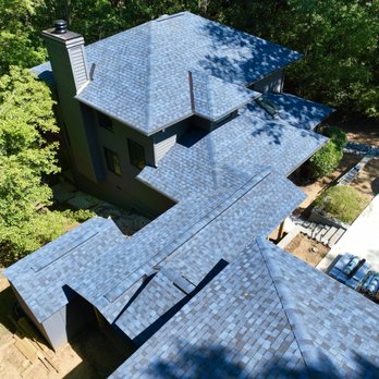 Vanguard Roofing - Finished roof installation featuring IKO Atlantic Blue architectural shingles. This color gives the home a clean, modern look. - Roofing Near Me - Charlotte, North Carolina Vanguard Roofing - Finished roof installation featuring IKO Atlantic Blue architectural shingles. This color gives the home a clean, modern look. - Roofing Near Me - Charlotte, North Carolina