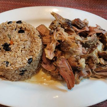 Tu Casa Restaurant - a plate of food with rice and meat - Peruvian Near Me - Forest Hills, New York Tu Casa Restaurant - a plate of food with rice and meat - Peruvian Near Me - Forest Hills, New York