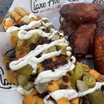 Clare Ave Grille - Smoked Honey BBQ wings and loaded fries (fries not worth the $3 upcharge) - Sandwiches Near Me - West Palm Beach, Florida Clare Ave Grille - Smoked Honey BBQ wings and loaded fries (fries not worth the $3 upcharge) - Sandwiches Near Me - West Palm Beach, Florida