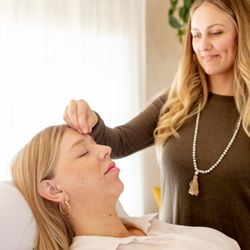 Golden Hour Acupuncture & Wellness - Kirsten Malmendier, L.Ac. working with a patient