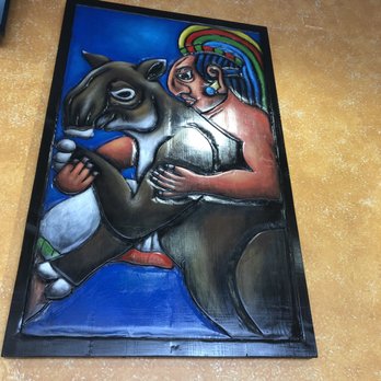 The Grain Cafe - Inside the Grain Cafe (beautiful panel craving of Latin-American Art) - Pizza Near Me - Redondo Beach, California