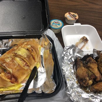 Winner's Pizza - a sandwich and chicken wings - Pizza Near Me - Houston, Texas