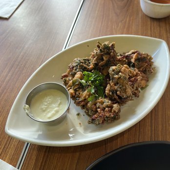 Aahaar an Indian Eatery - Spinach Cashew Pakora: spinach, cashew & spices are fried with chickpea batter into crispy slightly dense fritter balls. $8   4* - Indian Near Me - Snoqualmie, Washington