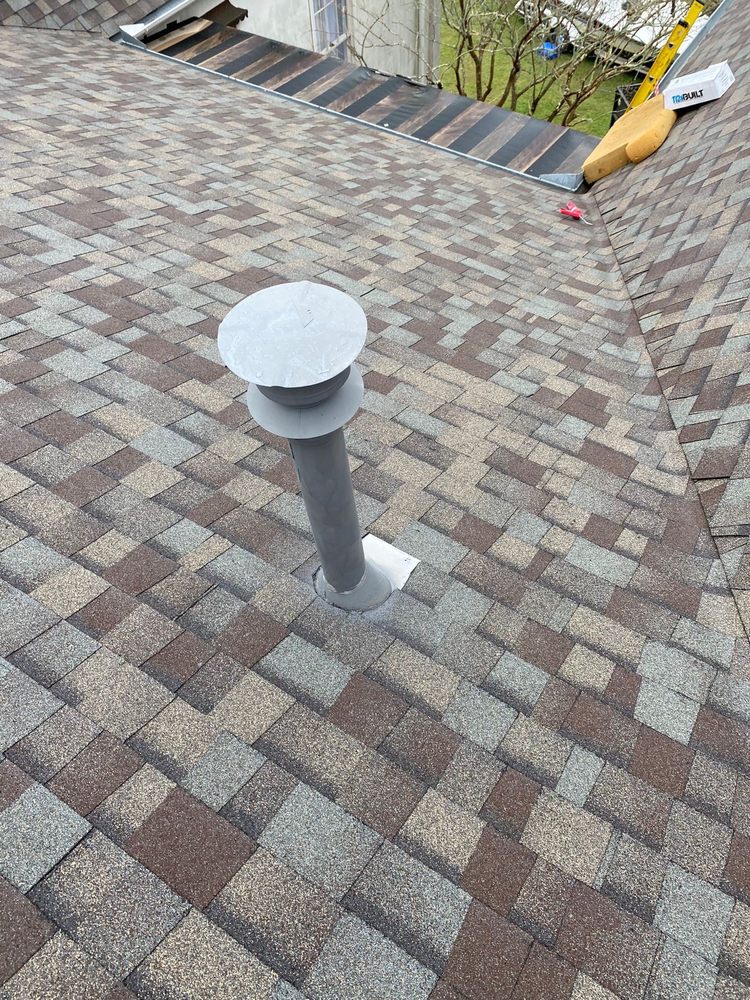 Slide of Ik Roofing & Reconstruccion