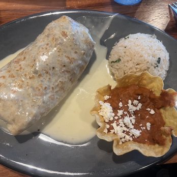 Queso's Plainfield - Deluxe burrito, cilantro rice and refried beans. - Bars Near Me - Plainfield, Indiana