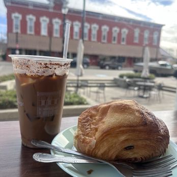 The Exchange - Iced oat milk latte with a chocolate croissant - Coffee & Tea Near Me - Canal Fulton, Ohio The Exchange - Iced oat milk latte with a chocolate croissant - Coffee & Tea Near Me - Canal Fulton, Ohio