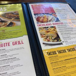 Filthy menu food spots all over it and grimy yucky to touch let alone look at. When are they wiped down Filthy menu food spots all over it and grimy yucky to touch let alone look at. When are they wiped down
