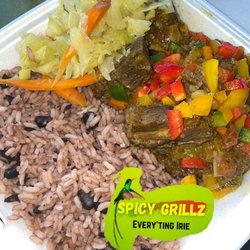 Spicy Grillz - Curry Goat, Rice and peas with Steamed veggies